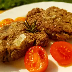Steaks with tomatoes