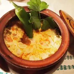 Clay Pots with Feta Cheese and Sausages