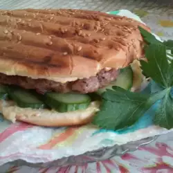 Burger with cucumbers