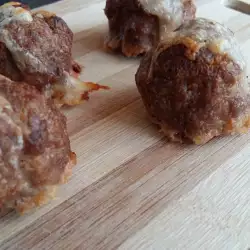 Oven-Baked Meatballs with Yellow Cheese