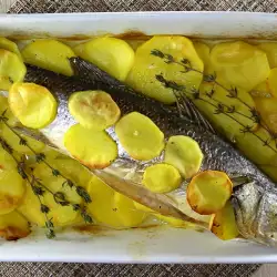 Sea bass with potatoes and Olive Oil