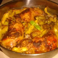 Chicken Legs with Potatoes and Curry in the Oven