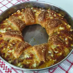 Pizza Wreath with Cheese, Feta Cheese, Sausages and Chutney