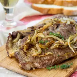 Steaks with onions