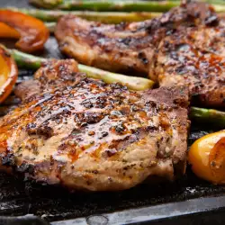 Neck Steaks with the Bone in a Marinade on the Grill