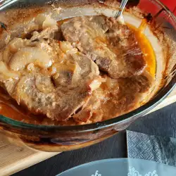 Pork Neck Steaks with Onions
