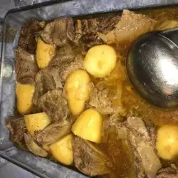 Beef Tongue with Onions and Baked Potatoes