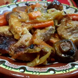 Neck Steaks with Vegetables in a Clay Container