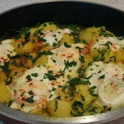 Stewed Potatoes with Eggs Under a Lid