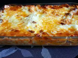 Lasagna with Bechamel Sauce, Cheese and Olives