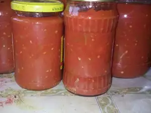 Peppers with Tomato Sauce and Garlic in Jars