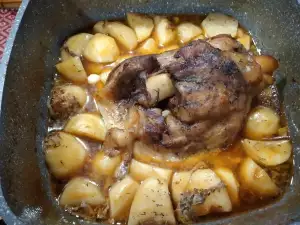 Oven-Baked Pork Shank with Potatoes and Beer