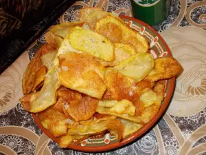 Crispy Homemade Chips with Stewed Garlic and Dill