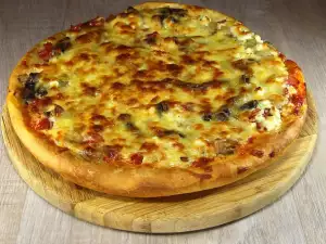 Homemade Pizza with Cheese and Mushrooms