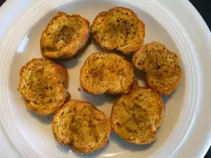 Homemade Bruschettas with Garlic, Butter, Mixed Herbs and Salt