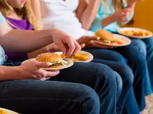 People eating burgers