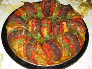 Meatballs with Potatoes and Tomatoes in the Oven