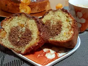 Cake with Candied Orange Peels and Raisins