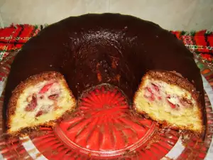 Cake with Strawberries and Chocolate Sauce