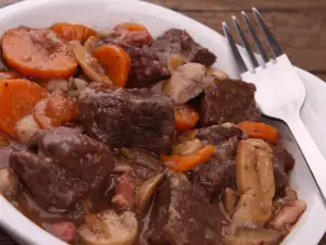 Shank with Potatoes and Mushrooms in the Oven