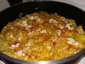 Fried Potatoes with Eggs and Feta Cheese