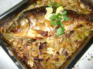 Stuffed Carp with Sauce in the Oven