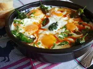 Spicy Chili Peppers with Eggs Sunny Side Up in Sauce