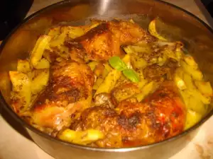 Chicken Legs with Potatoes and Curry in the Oven