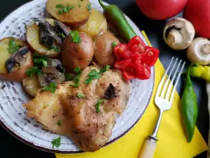 Oven-Baked Chicken Steaks with Mushrooms and Potatoes