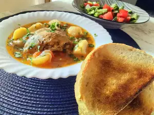 Chicken Stew with Onions and Tomatoes in a Multicooker