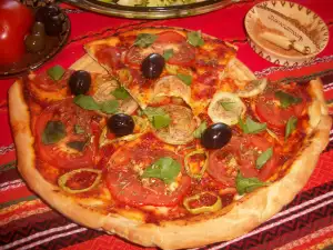 Vegan Pizza with Tomatoes, Olives and Basil