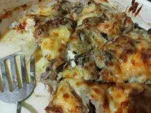 Tasty Oven-Baked Turkey Meat with Mushrooms and Processed Cheese