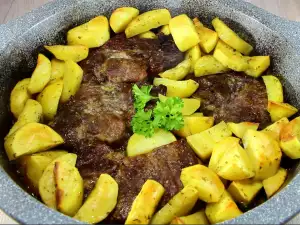 Pork Chops with Baked Potatoes