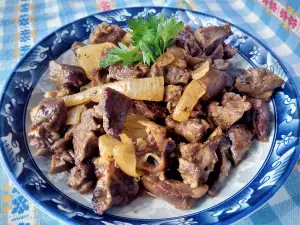 Pork Hearts with Onions and Butter