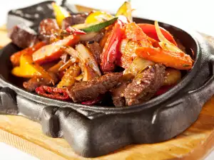 Pork and Vegetables on a Clay Dish