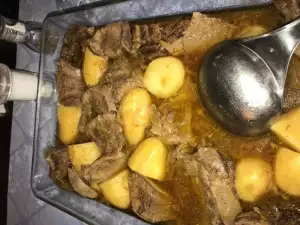 Beef Tongue with Onions and Baked Potatoes