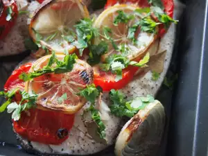 Baked Silver Carp with Tomatoes and Onions