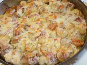 Casserole with Potatoes, Bacon and Feta Cheese