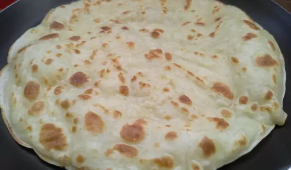 Arabic Pita Breads on a Skillet