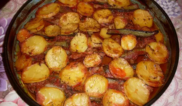 Tender Beer-Flavored Clod with Potatoes and Pickles in the Oven