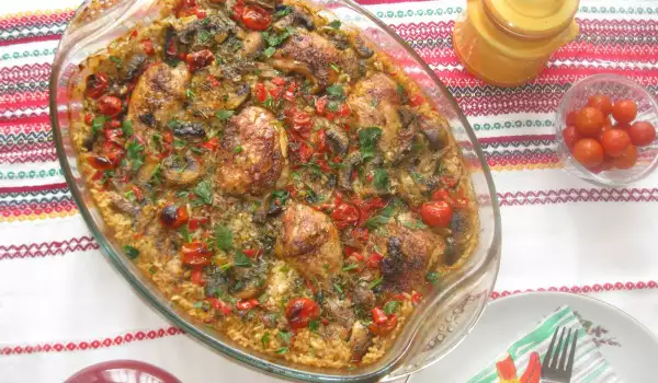 Chicken Drumsticks with Rice, Mushrooms and Cherry Tomatoes