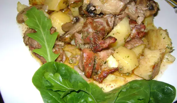 Shank with Potatoes and Mushrooms in a Clay Pot