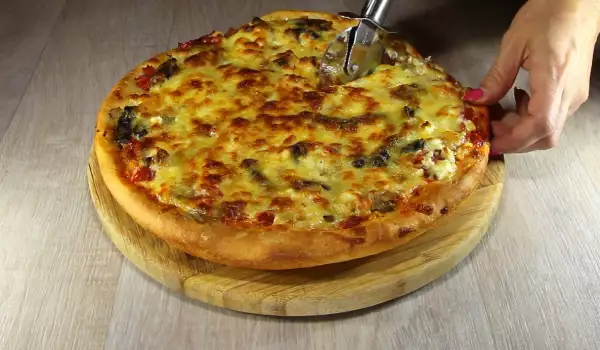 Homemade Pizza with Cheese and Mushrooms