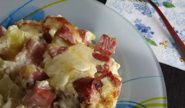 Oven-Baked Potatoes with Smoked Meat and Cream