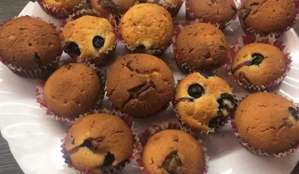 Blueberry Muffins with Pieces of Chocolate