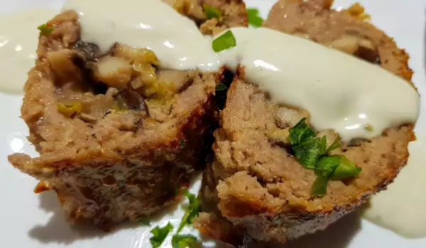 Meat Roll with Mushrooms and Blue Cheese Sauce