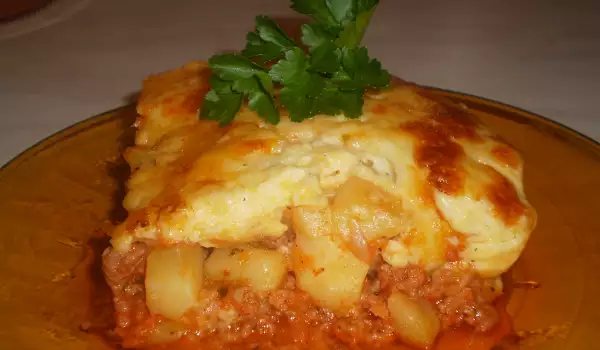 Moussaka with Bechamel Sauce and Cheese Crust