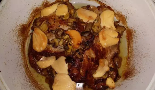 Pork Steaks with Mushrooms, Processed Cheese and Wine
