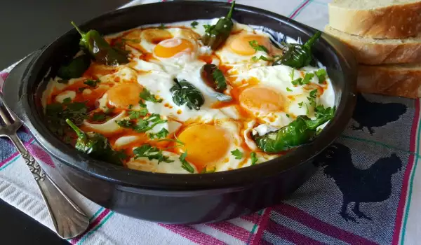 Spicy Chili Peppers with Eggs Sunny Side Up in Sauce