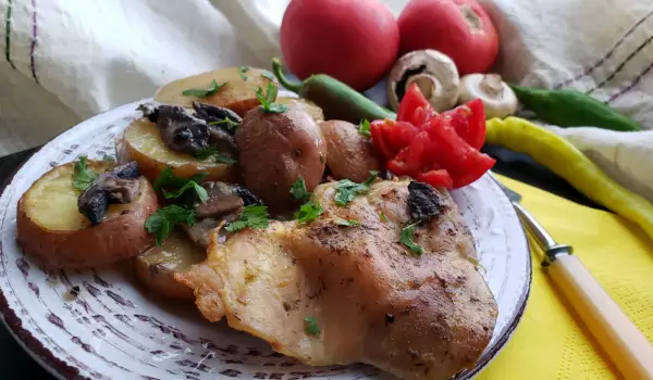 Oven-Baked Chicken Steaks with Mushrooms and Potatoes